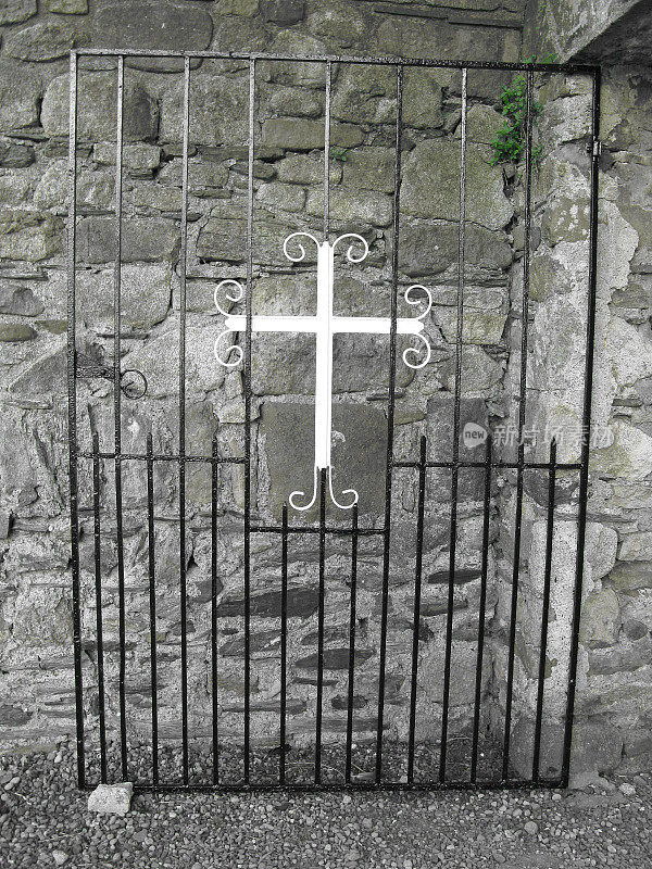 Black Iron Gate with Cross in Center at Ireland Cemetery